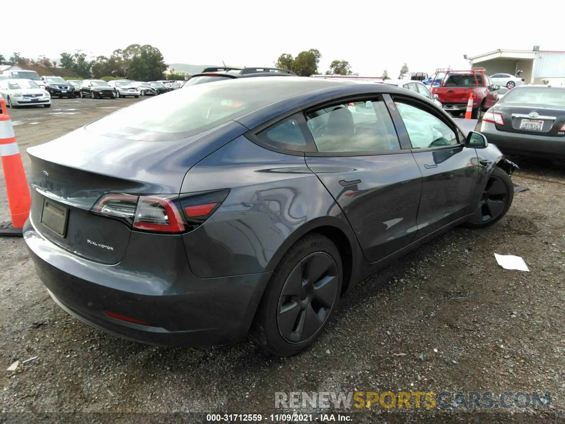 4 Photograph of a damaged car 5YJ3E1EBXMF874913 TESLA MODEL 3 2021