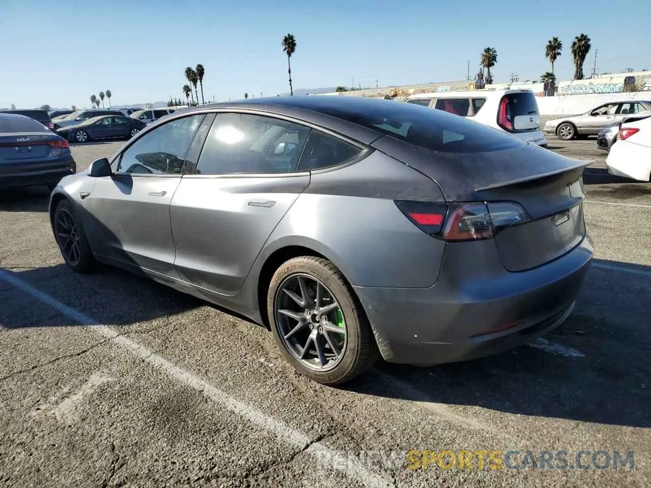 2 Photograph of a damaged car 5YJ3E1EBXMF938271 TESLA MODEL 3 2021
