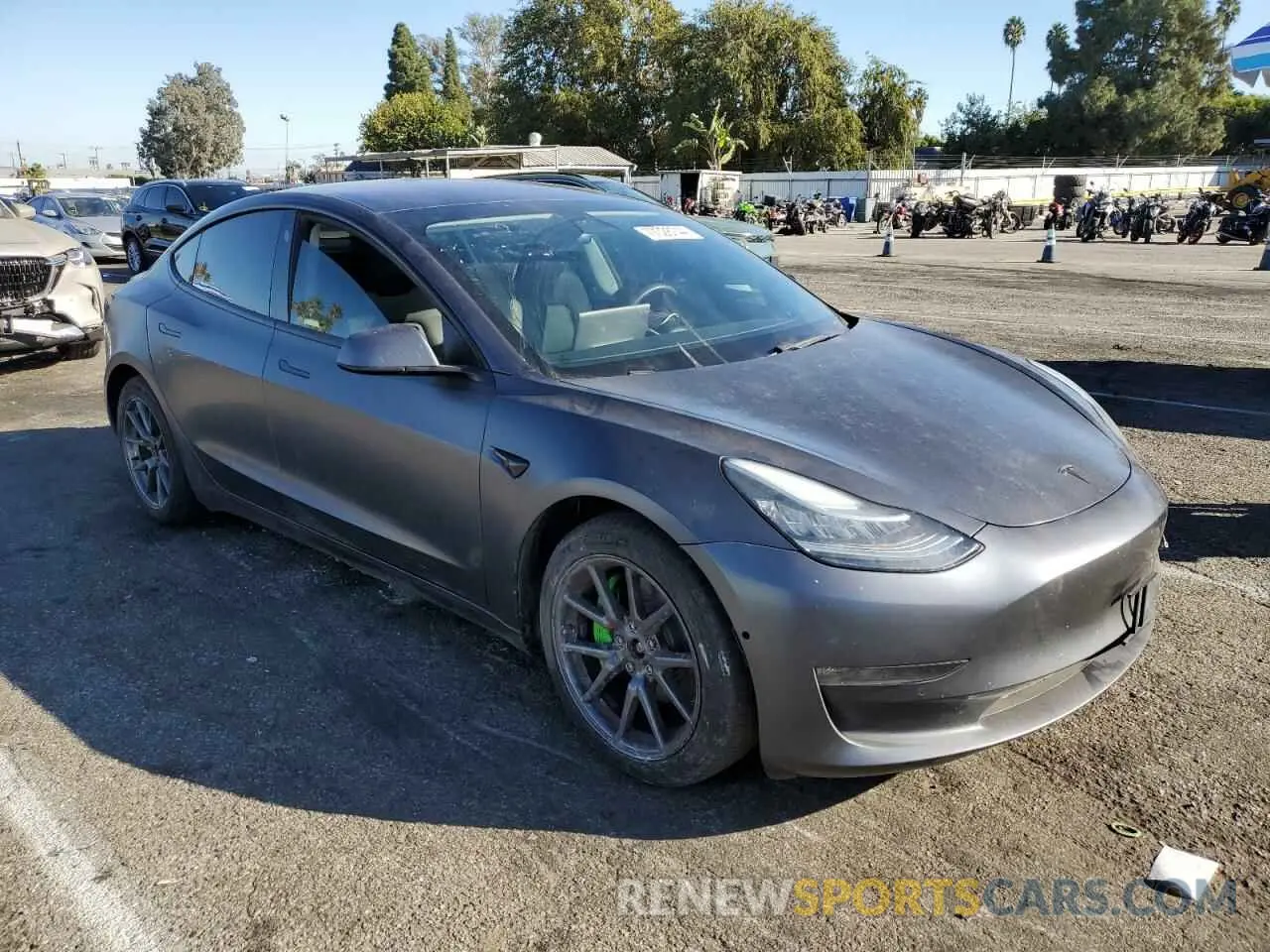 4 Photograph of a damaged car 5YJ3E1EBXMF938271 TESLA MODEL 3 2021