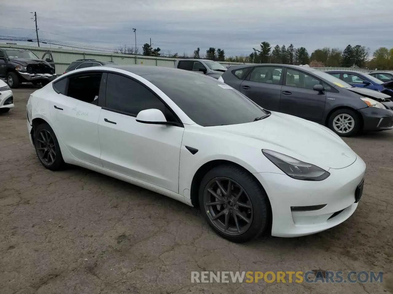 4 Photograph of a damaged car 5YJ3E1EBXMF938965 TESLA MODEL 3 2021