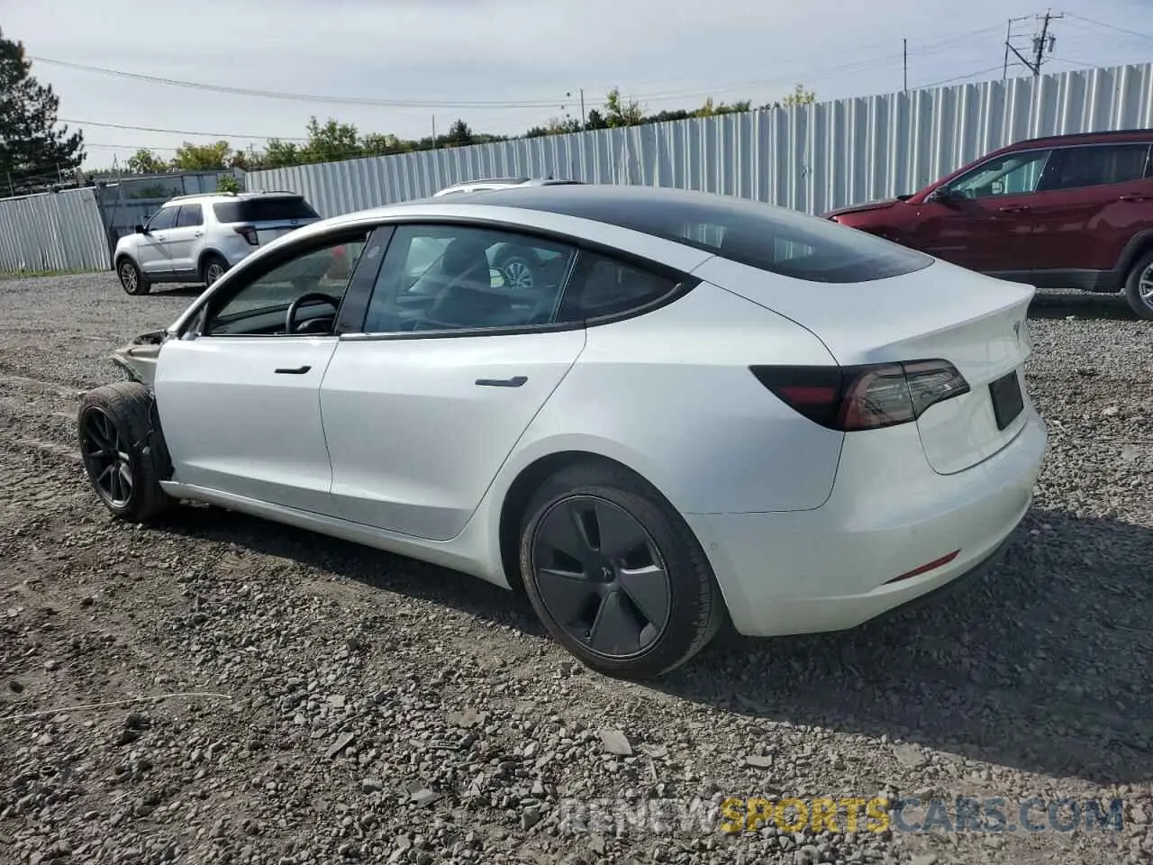 2 Photograph of a damaged car 5YJ3E1EBXMF992279 TESLA MODEL 3 2021