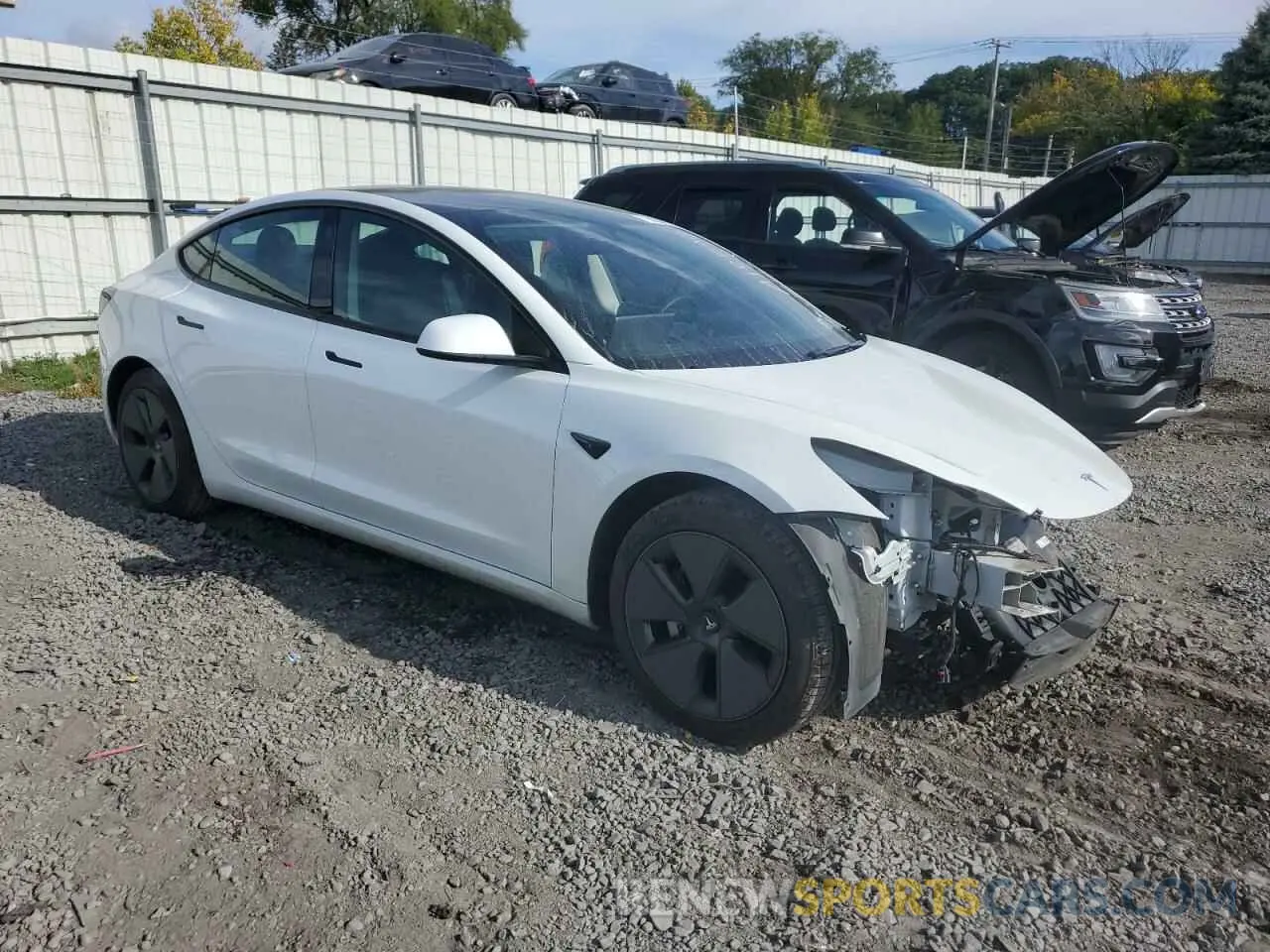 4 Photograph of a damaged car 5YJ3E1EBXMF992279 TESLA MODEL 3 2021