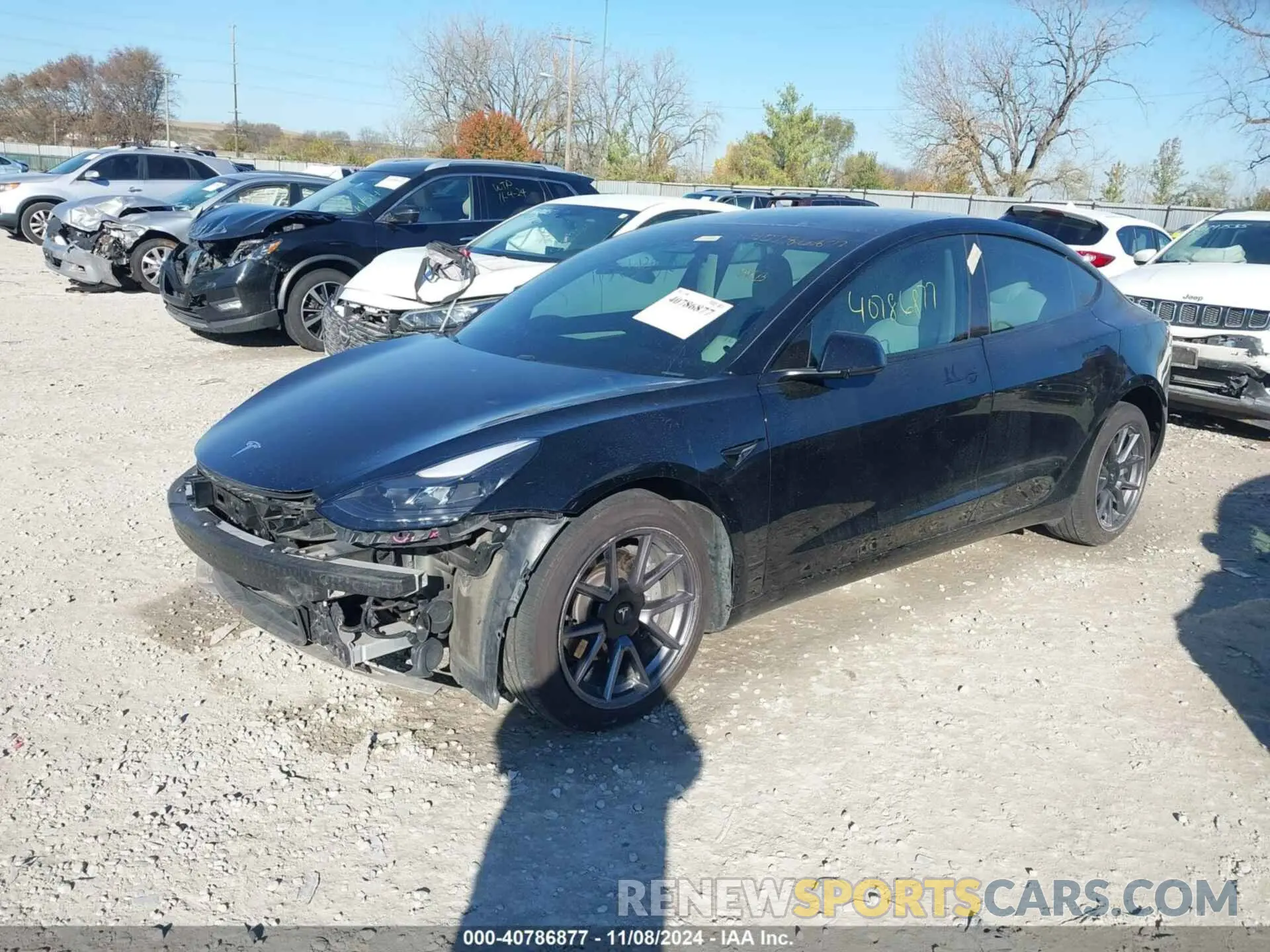 2 Photograph of a damaged car 5YJ3E1EBXMF992833 TESLA MODEL 3 2021