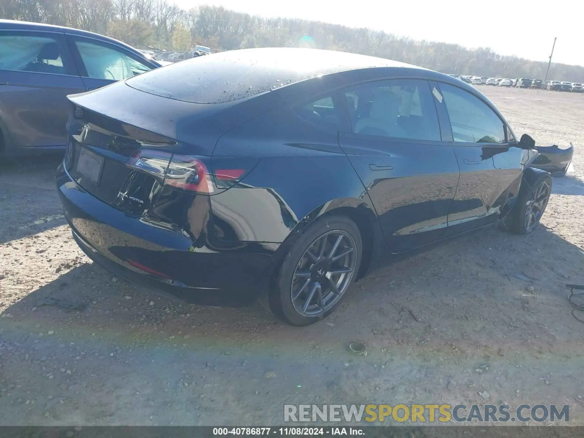4 Photograph of a damaged car 5YJ3E1EBXMF992833 TESLA MODEL 3 2021