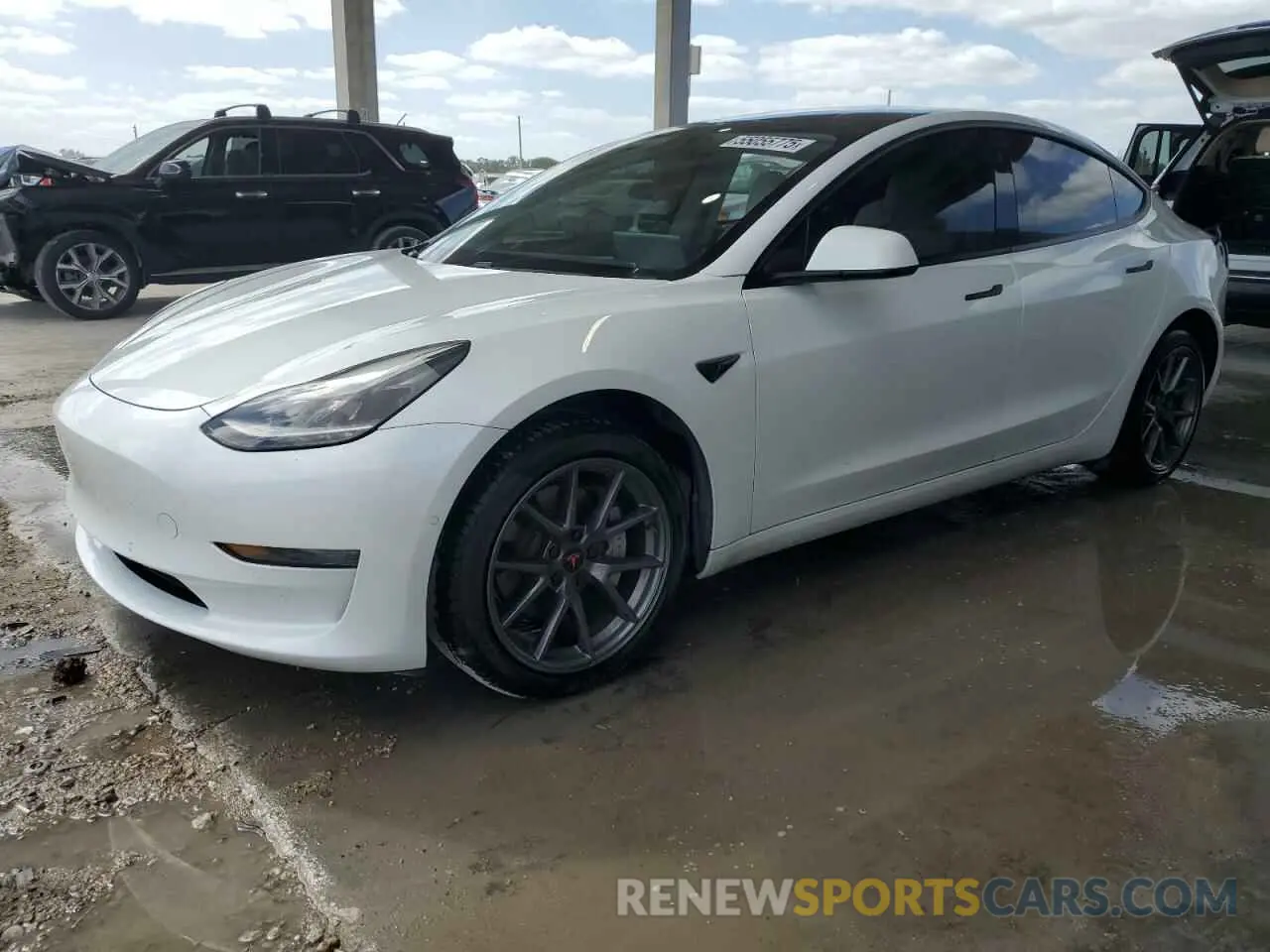 1 Photograph of a damaged car 5YJ3E1EBXMF993027 TESLA MODEL 3 2021