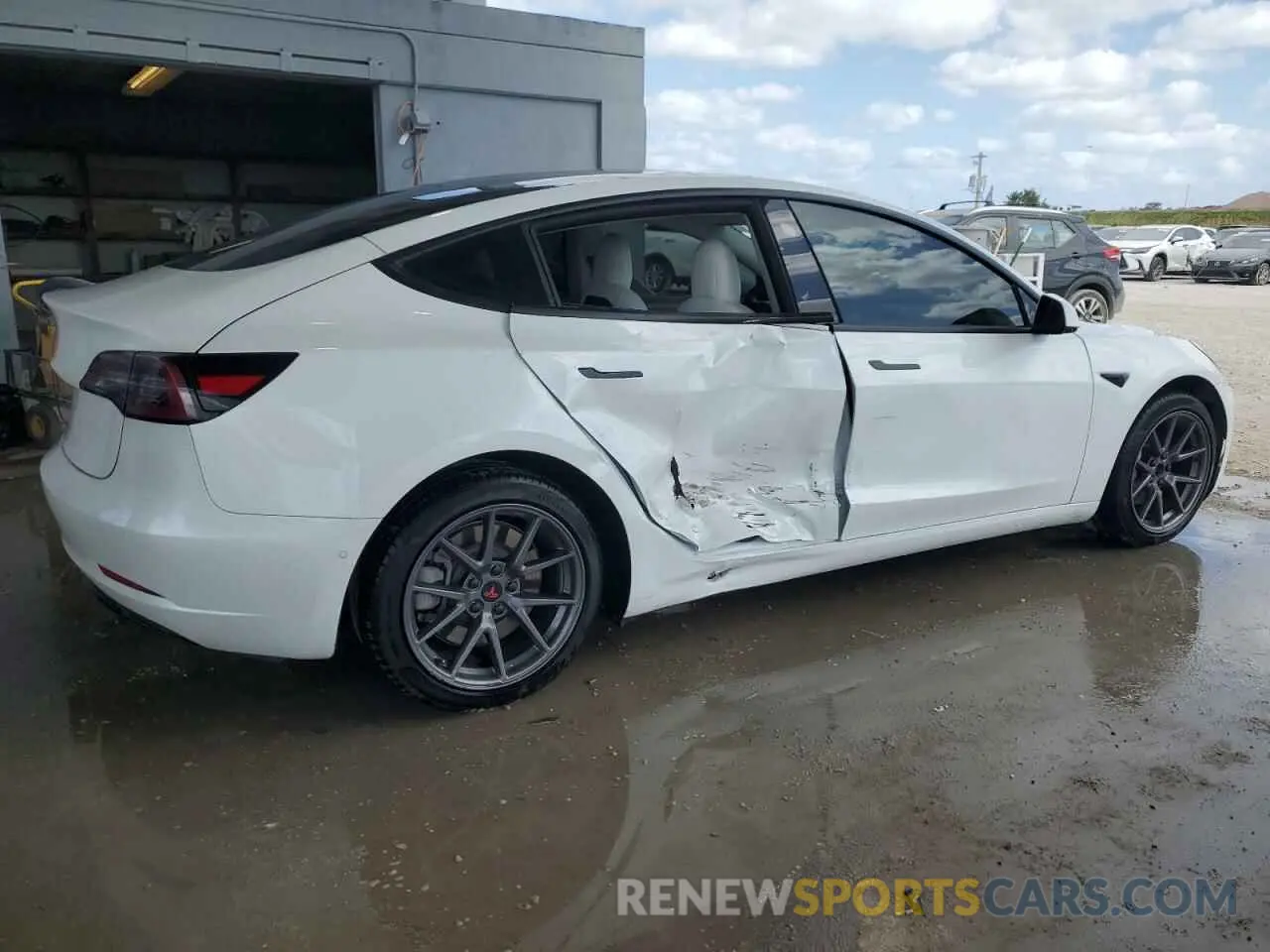 3 Photograph of a damaged car 5YJ3E1EBXMF993027 TESLA MODEL 3 2021
