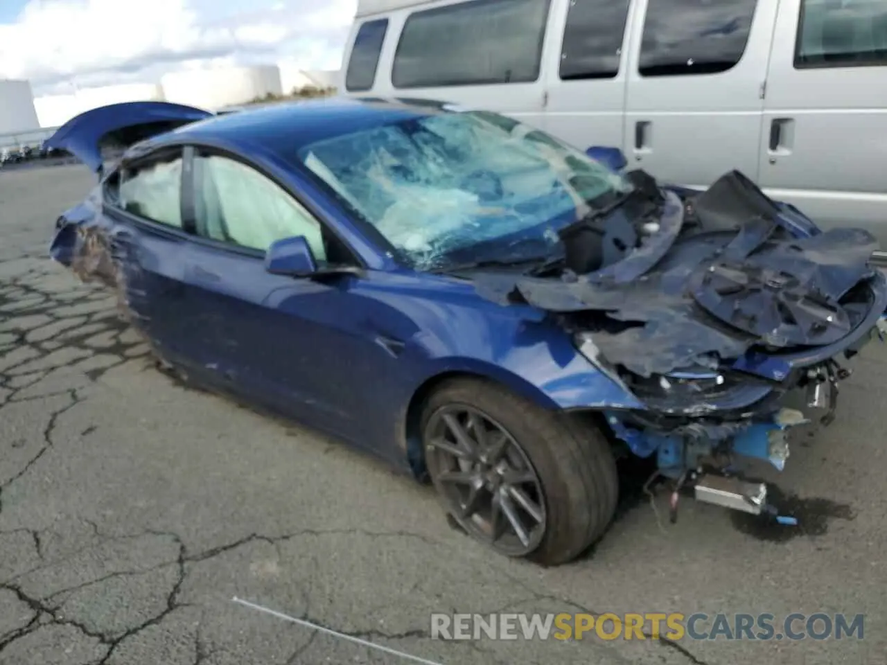 4 Photograph of a damaged car 5YJ3E1EBXMF999443 TESLA MODEL 3 2021