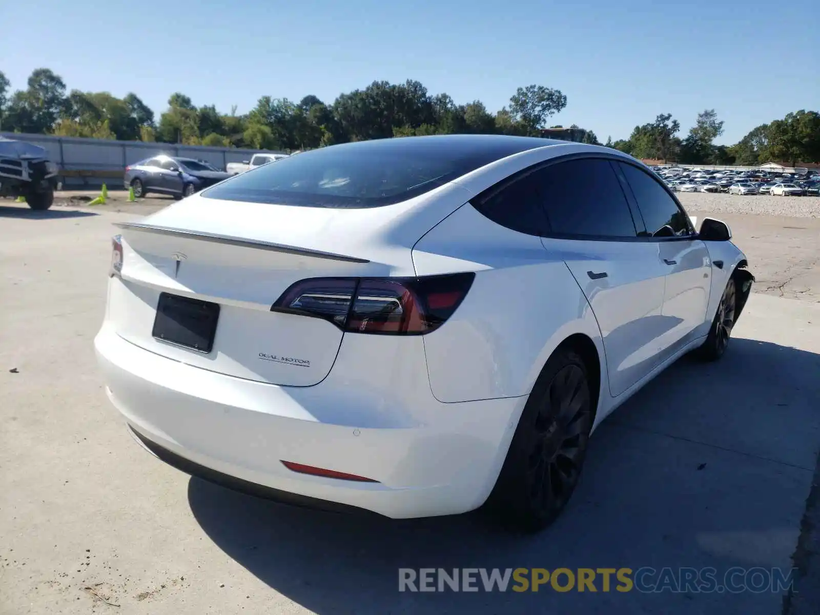 4 Photograph of a damaged car 5YJ3E1EC0MF037015 TESLA MODEL 3 2021