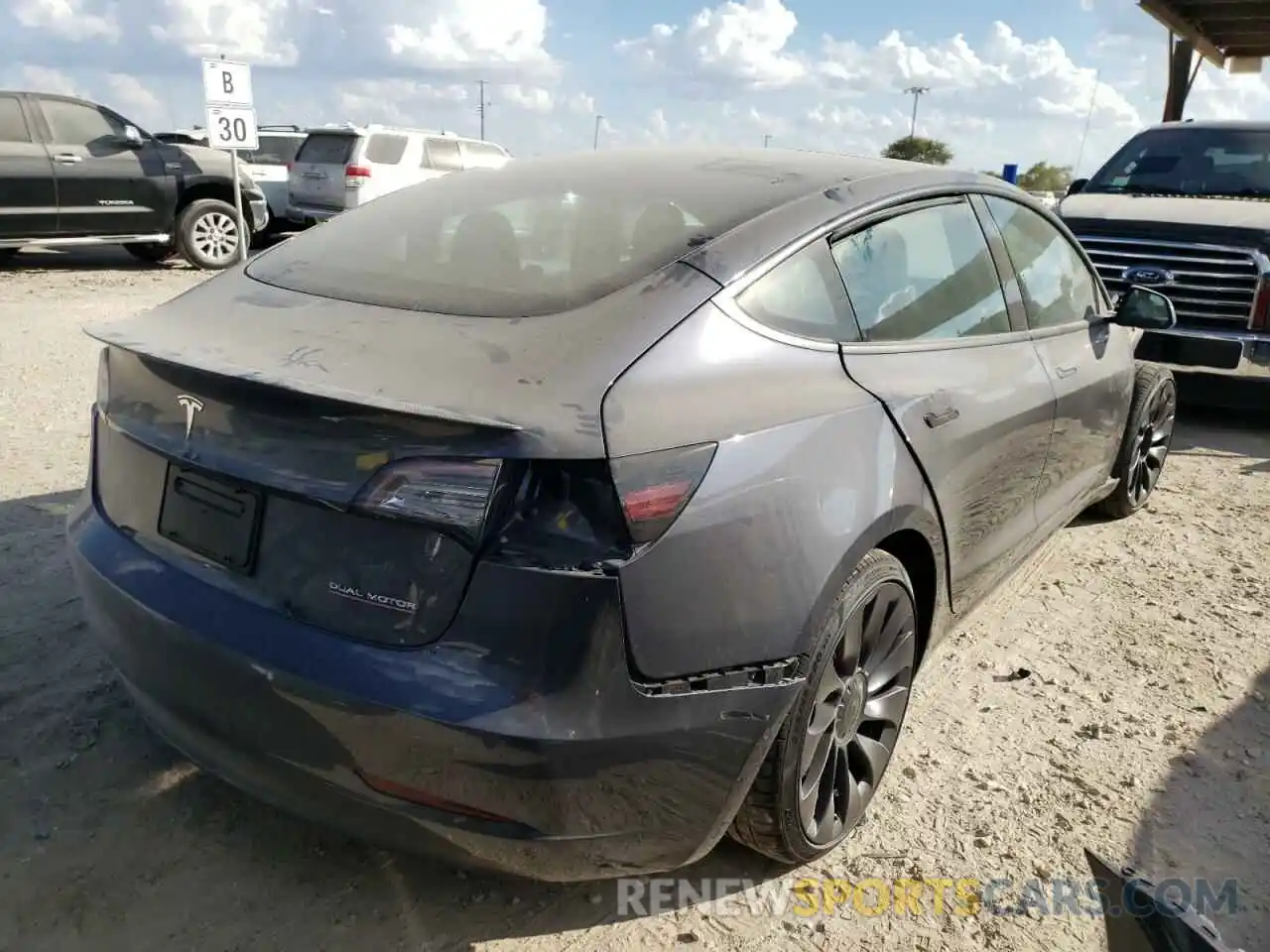 4 Photograph of a damaged car 5YJ3E1EC0MF992395 TESLA MODEL 3 2021