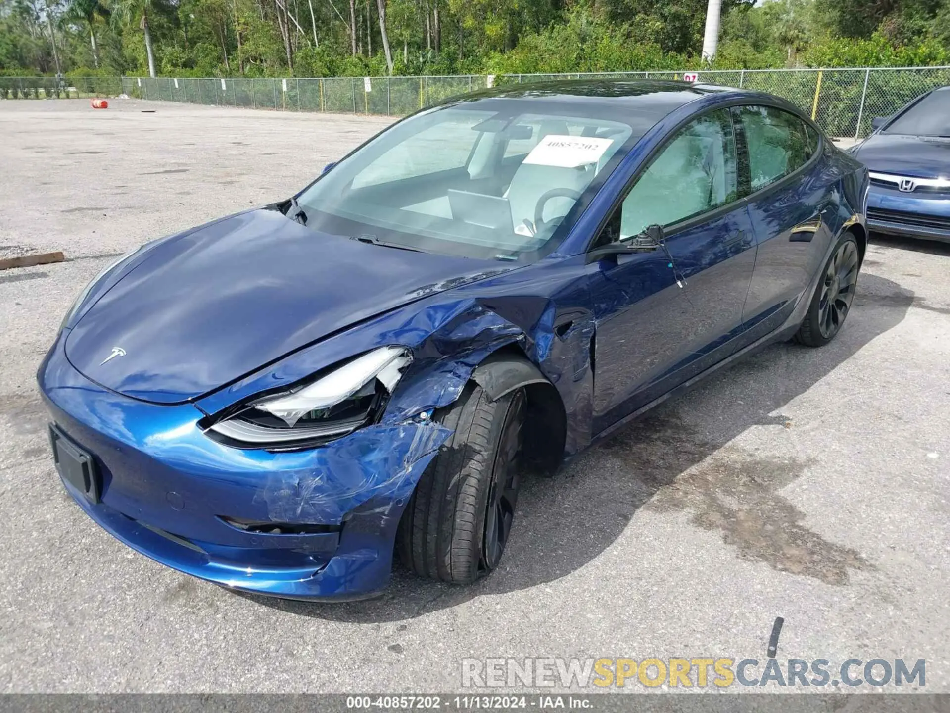 2 Photograph of a damaged car 5YJ3E1EC1MF919276 TESLA MODEL 3 2021