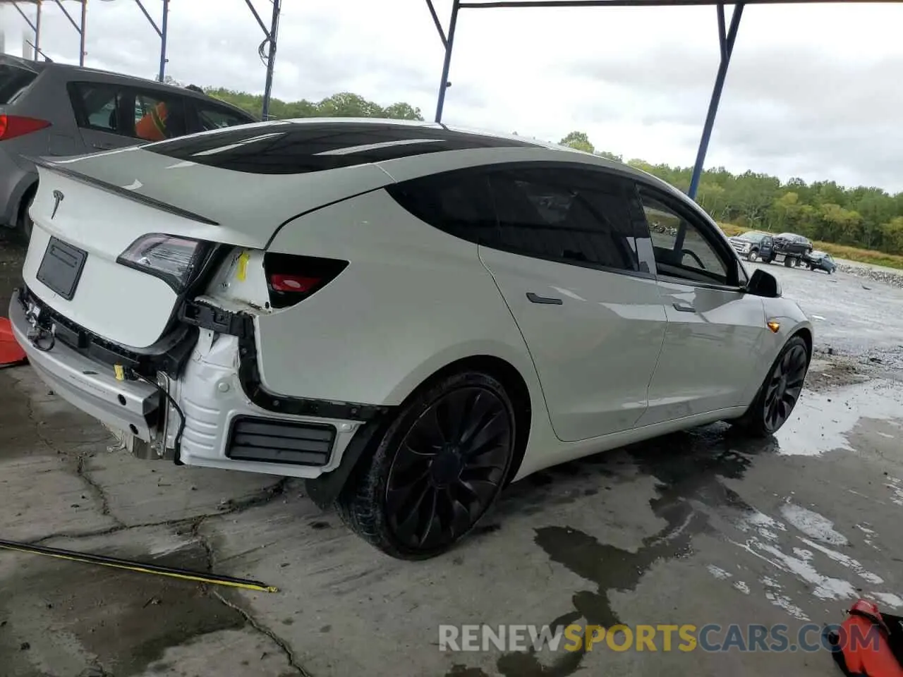 3 Photograph of a damaged car 5YJ3E1EC2MF061168 TESLA MODEL 3 2021