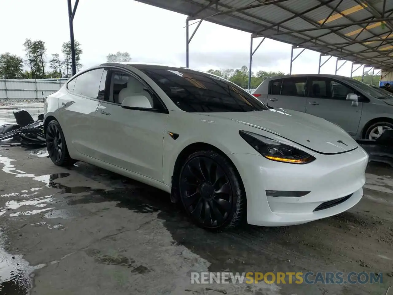 4 Photograph of a damaged car 5YJ3E1EC2MF061168 TESLA MODEL 3 2021