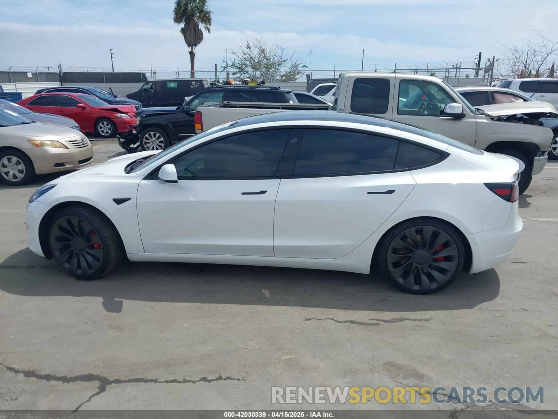 14 Photograph of a damaged car 5YJ3E1EC2MF084594 TESLA MODEL 3 2021
