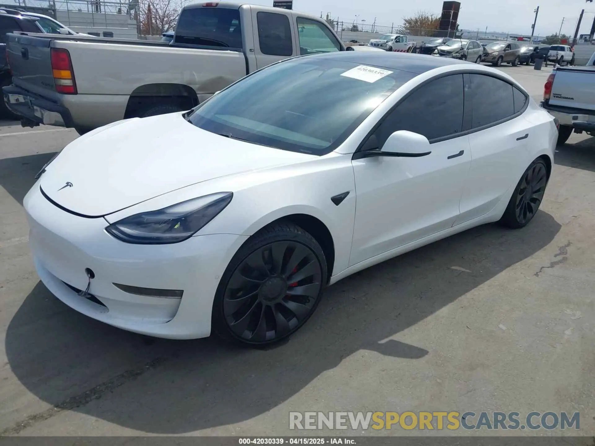 2 Photograph of a damaged car 5YJ3E1EC2MF084594 TESLA MODEL 3 2021