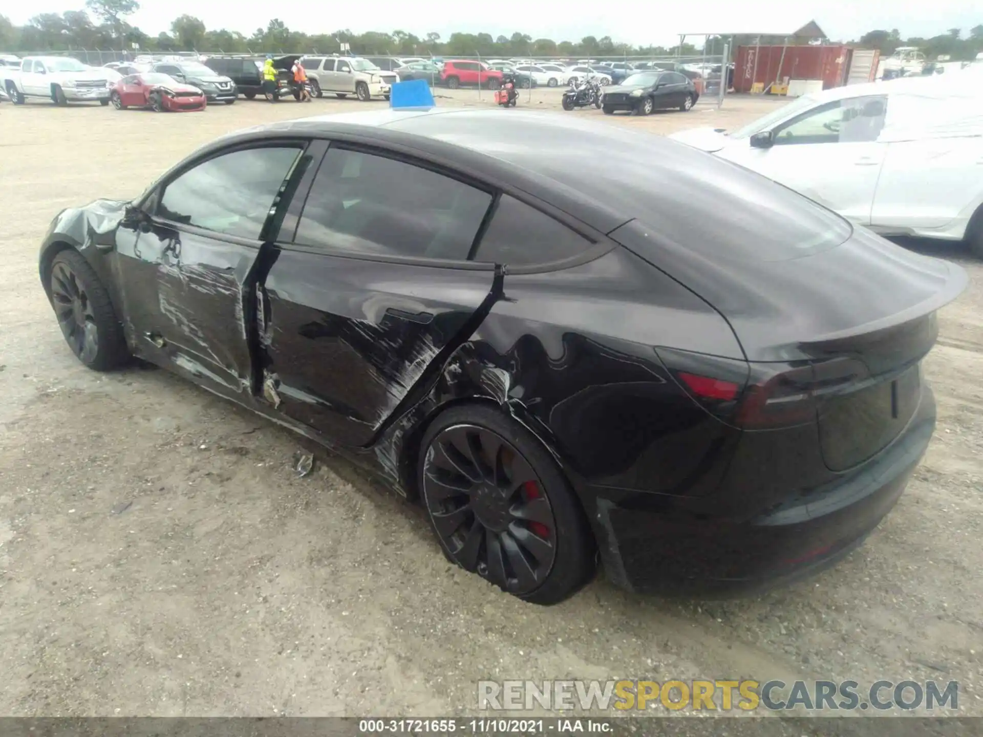 3 Photograph of a damaged car 5YJ3E1EC2MF913552 TESLA MODEL 3 2021