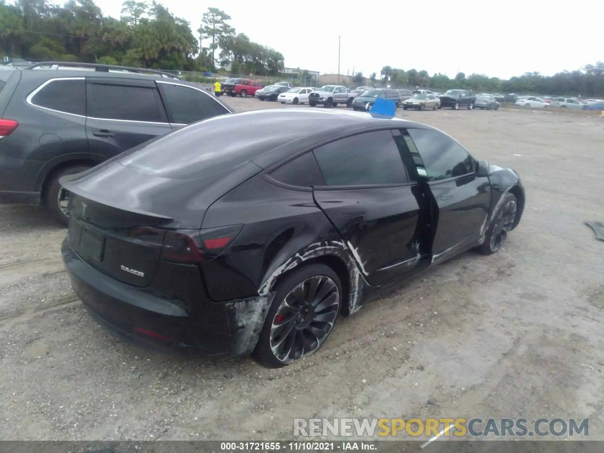 4 Photograph of a damaged car 5YJ3E1EC2MF913552 TESLA MODEL 3 2021