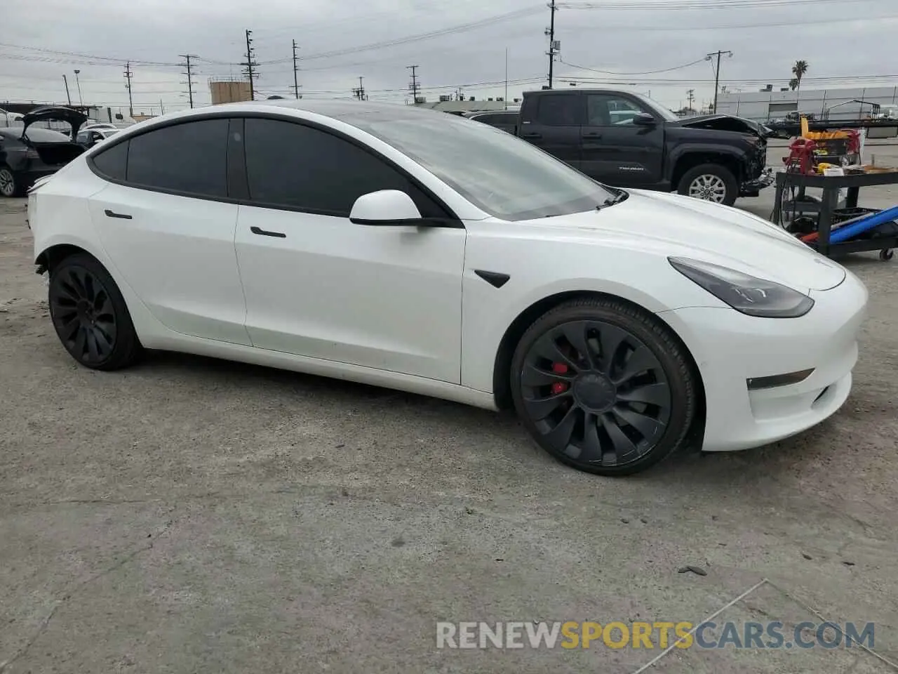 4 Photograph of a damaged car 5YJ3E1EC2MF935826 TESLA MODEL 3 2021