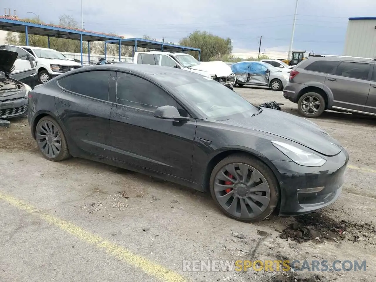 4 Photograph of a damaged car 5YJ3E1EC2MF984962 TESLA MODEL 3 2021