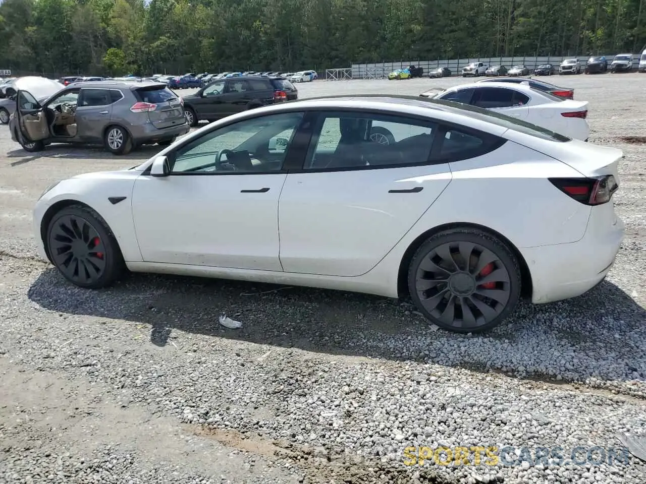 2 Photograph of a damaged car 5YJ3E1EC3MF030866 TESLA MODEL 3 2021