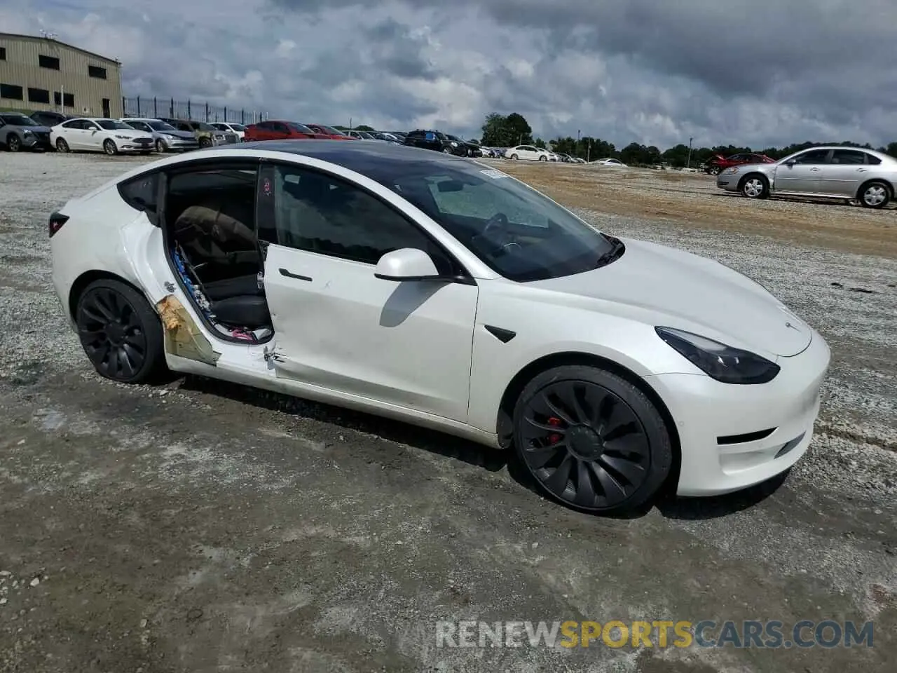 4 Photograph of a damaged car 5YJ3E1EC3MF030866 TESLA MODEL 3 2021
