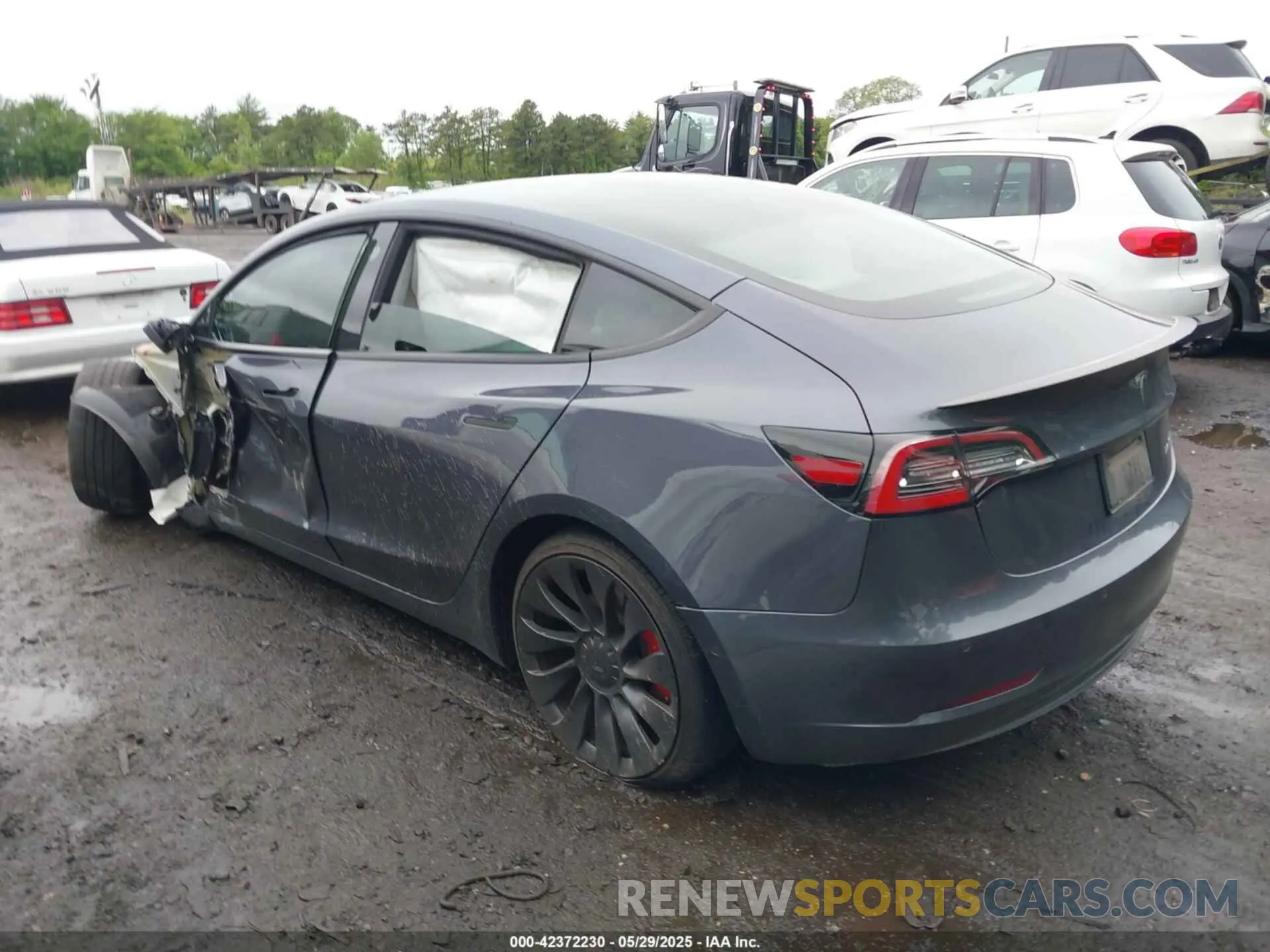 14 Photograph of a damaged car 5YJ3E1EC3MF056187 TESLA MODEL 3 2021
