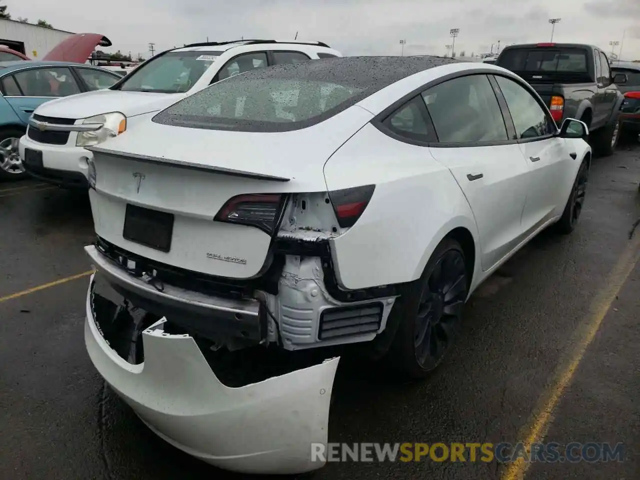 4 Photograph of a damaged car 5YJ3E1EC3MF850879 TESLA MODEL 3 2021