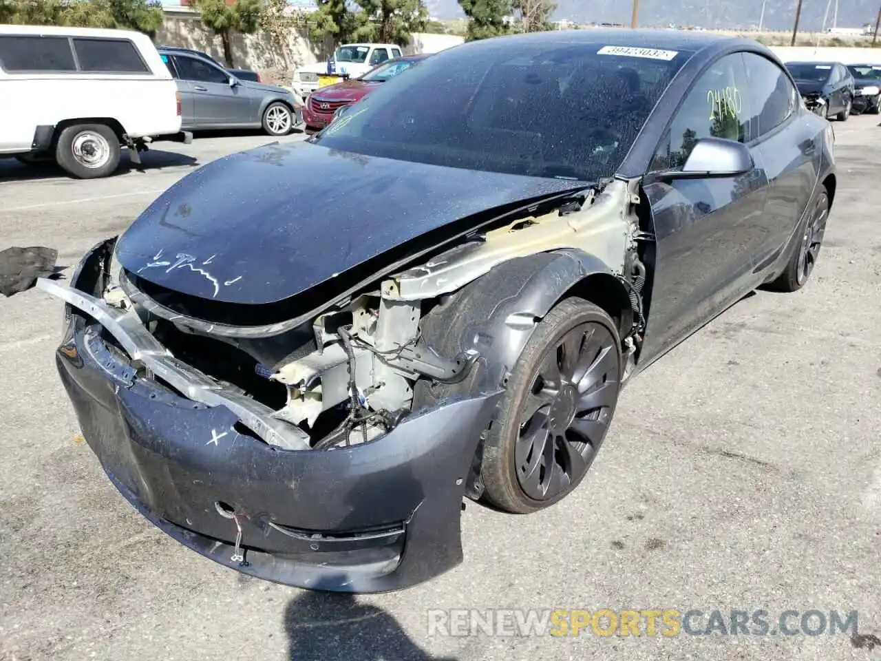 2 Photograph of a damaged car 5YJ3E1EC3MF926097 TESLA MODEL 3 2021