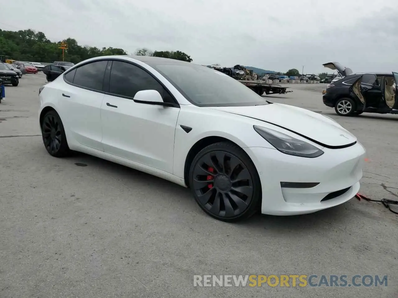 4 Photograph of a damaged car 5YJ3E1EC3MF984923 TESLA MODEL 3 2021