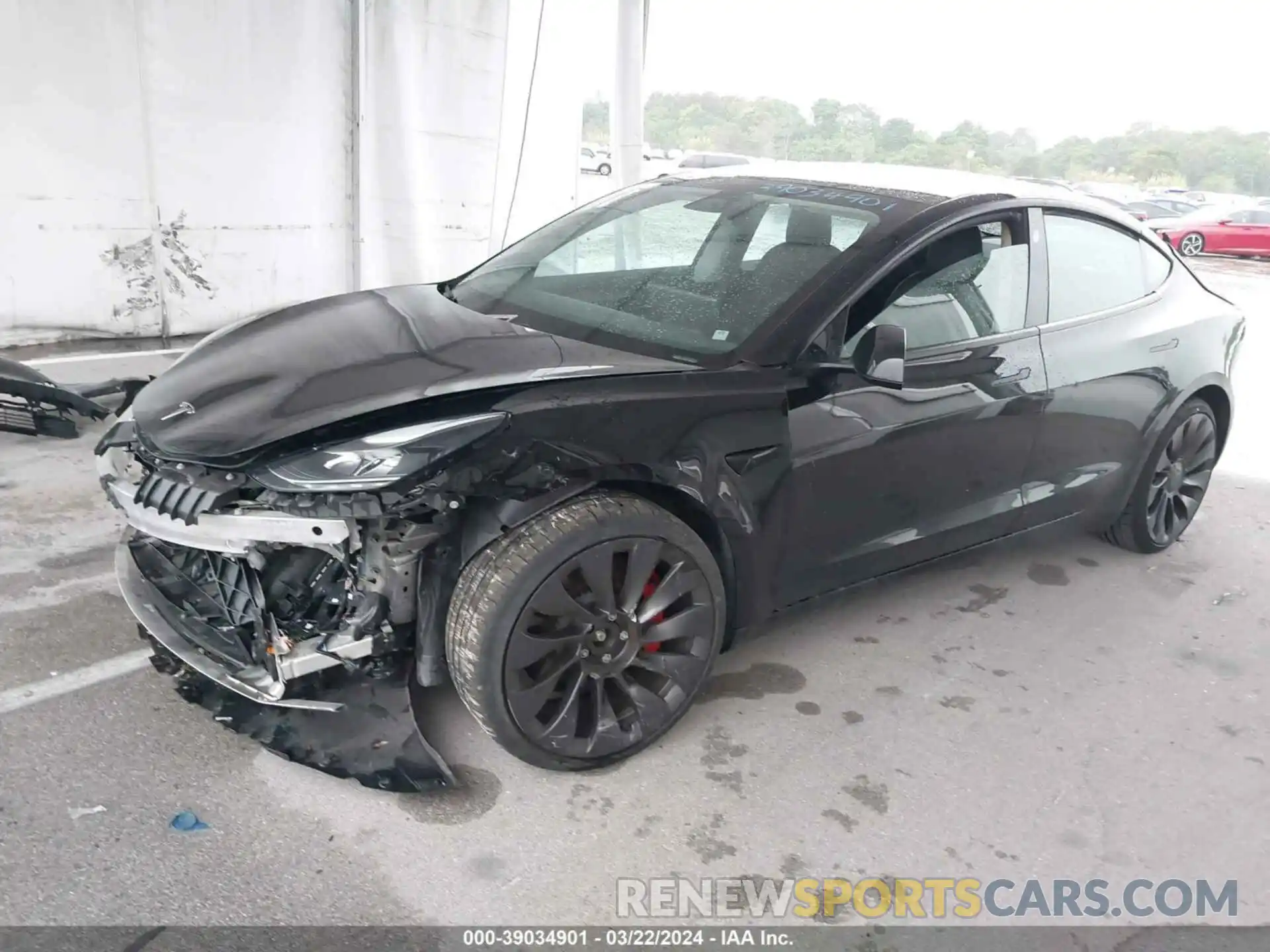 2 Photograph of a damaged car 5YJ3E1EC3MF990902 TESLA MODEL 3 2021