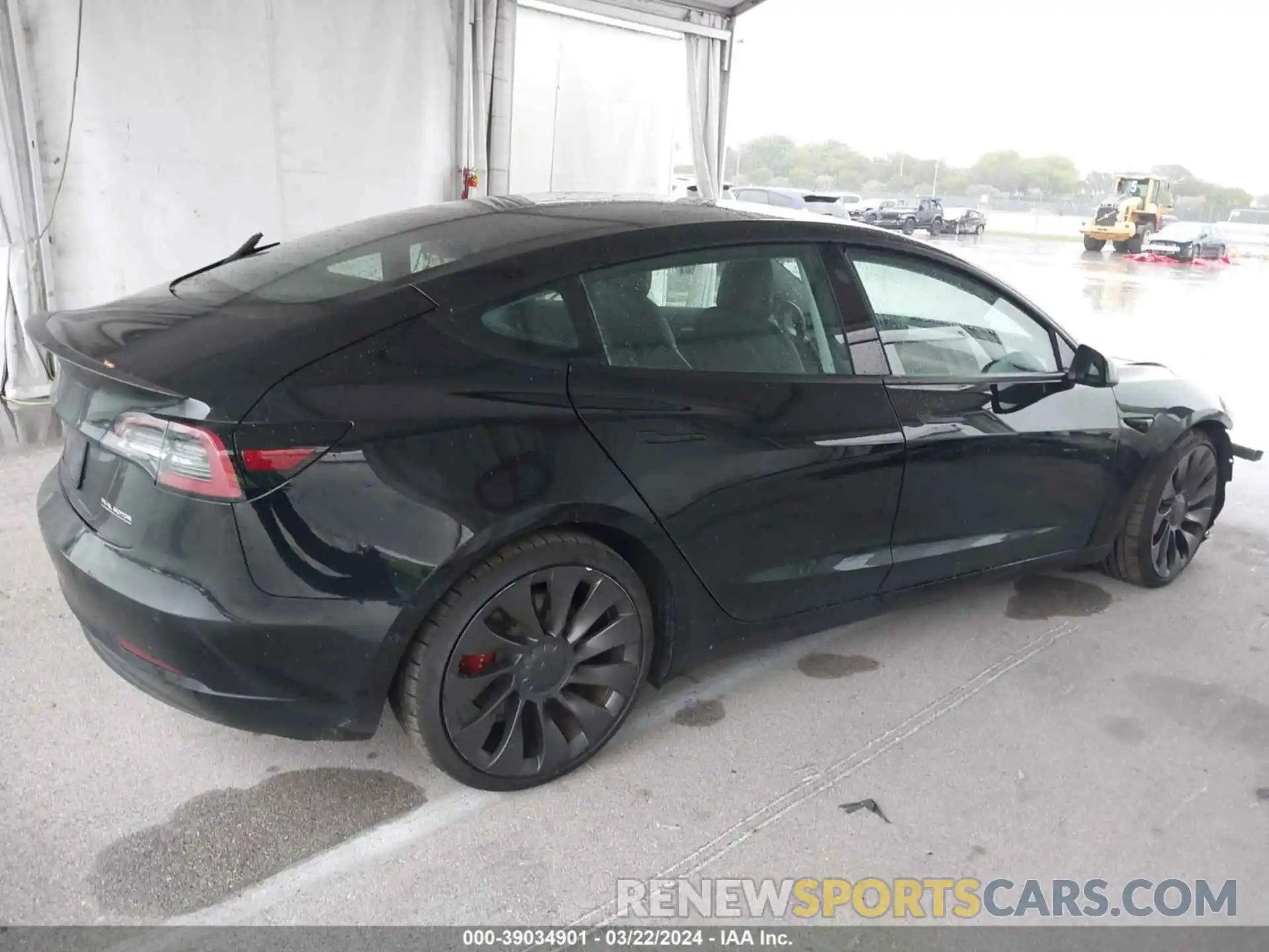 4 Photograph of a damaged car 5YJ3E1EC3MF990902 TESLA MODEL 3 2021