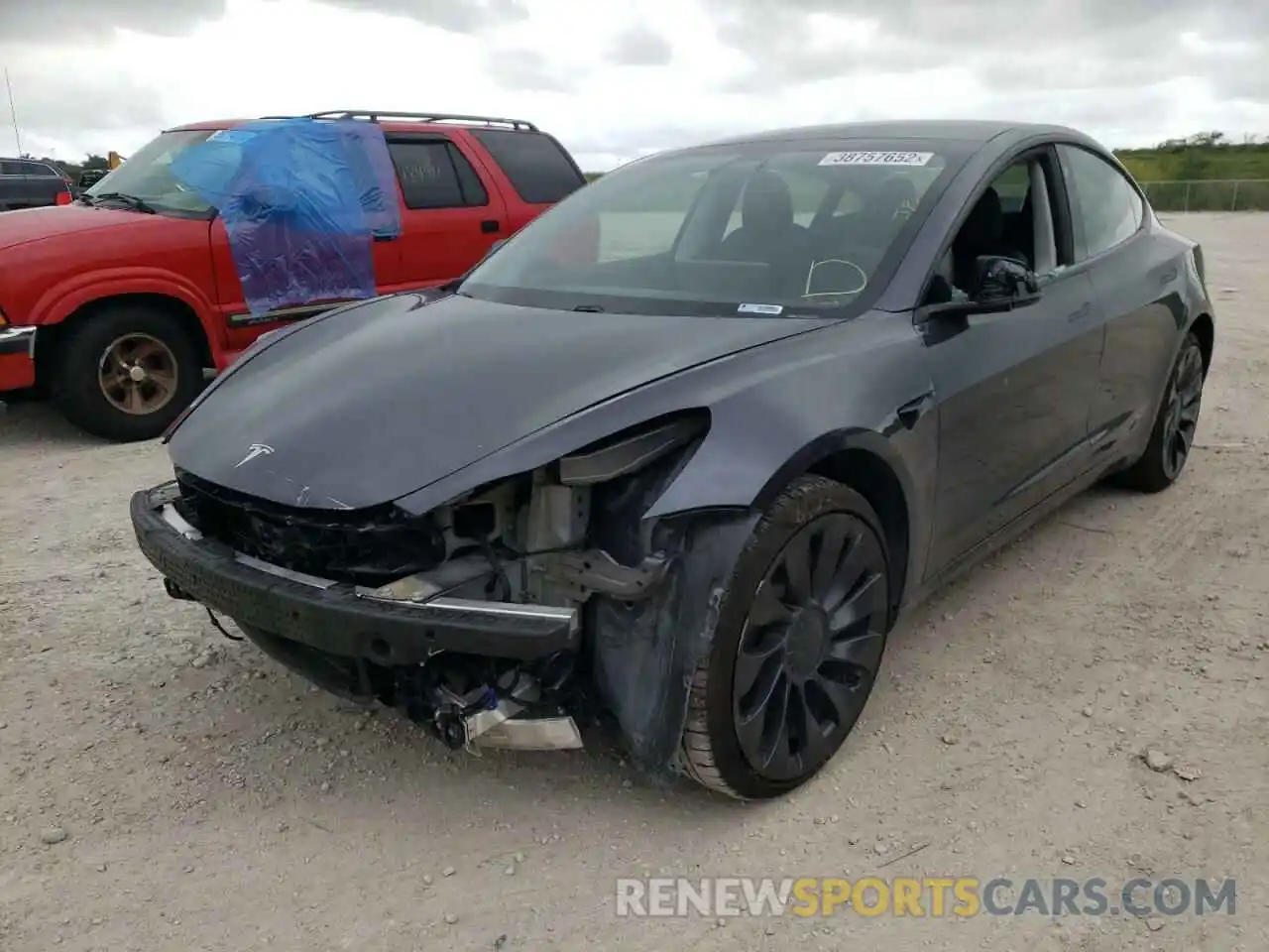 2 Photograph of a damaged car 5YJ3E1EC4MF030181 TESLA MODEL 3 2021