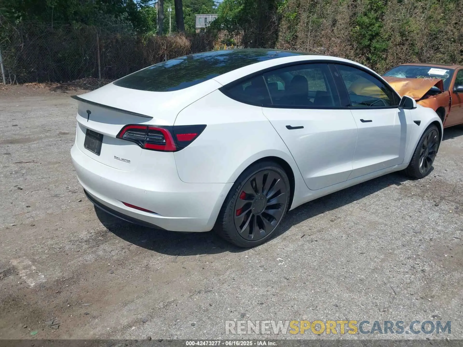 4 Photograph of a damaged car 5YJ3E1EC4MF044601 TESLA MODEL 3 2021