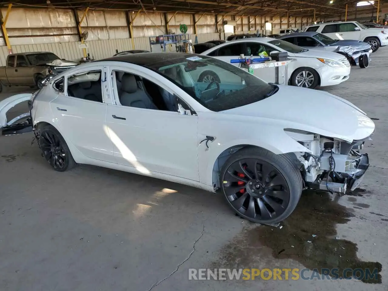 4 Photograph of a damaged car 5YJ3E1EC4MF988446 TESLA MODEL 3 2021