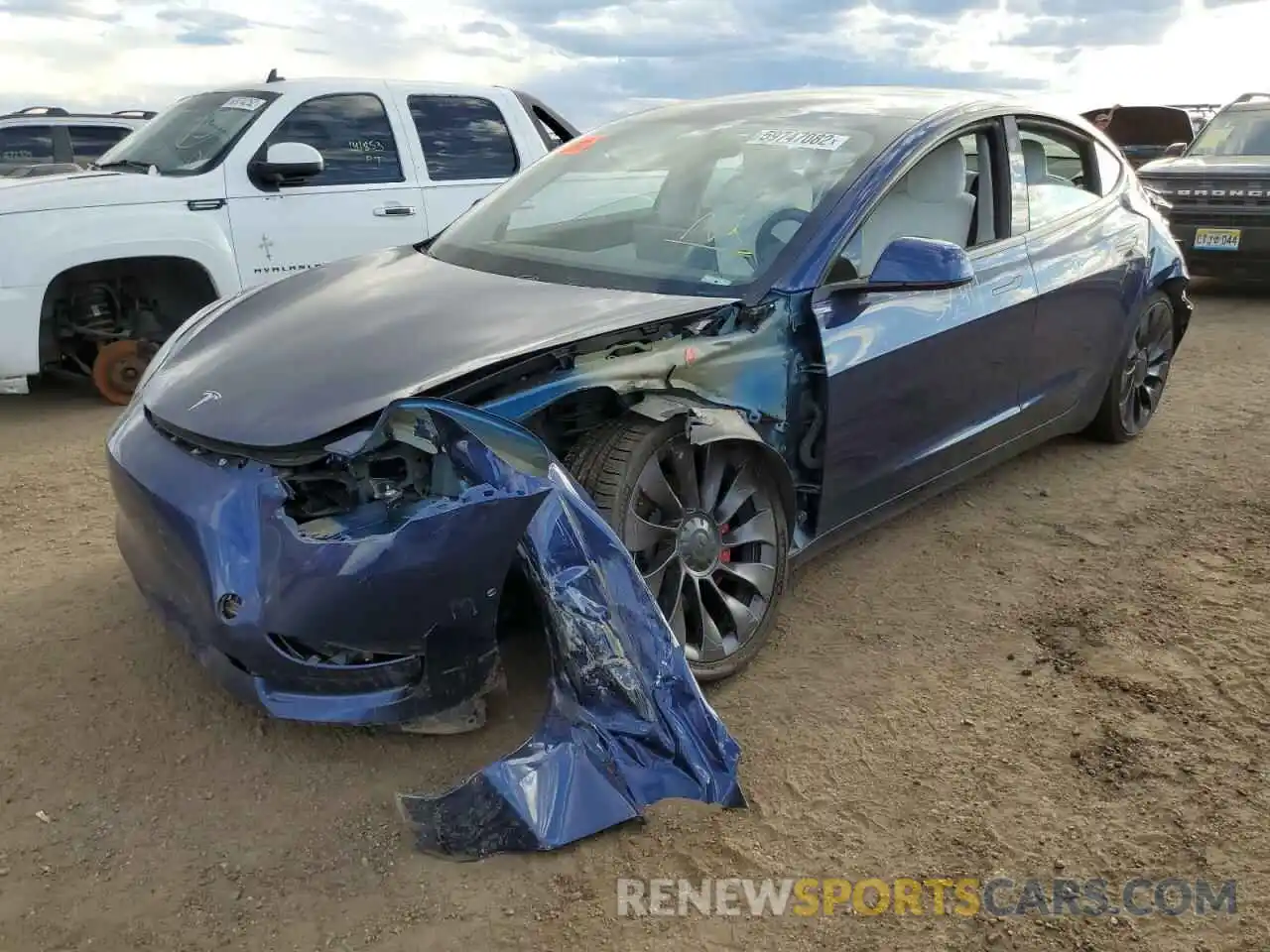 2 Photograph of a damaged car 5YJ3E1EC5MF856411 TESLA MODEL 3 2021