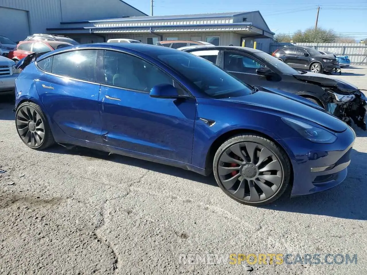 4 Photograph of a damaged car 5YJ3E1EC6MF071234 TESLA MODEL 3 2021