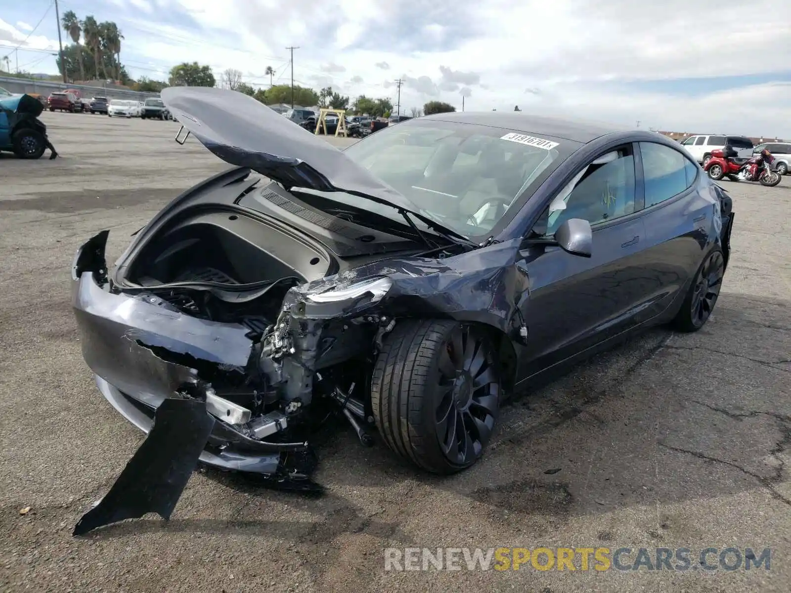 2 Photograph of a damaged car 5YJ3E1EC6MF874335 TESLA MODEL 3 2021