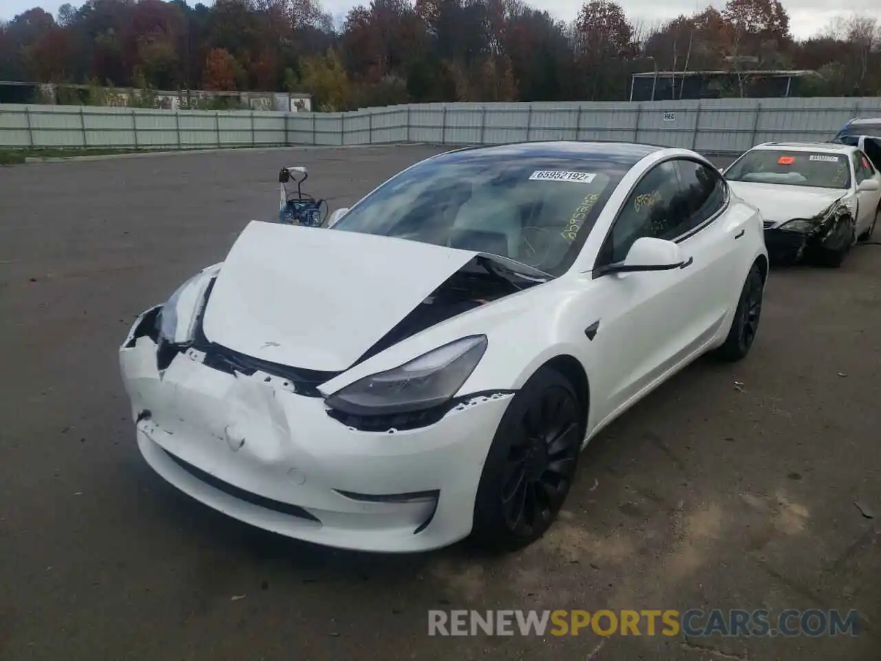 2 Photograph of a damaged car 5YJ3E1EC7MF063434 TESLA MODEL 3 2021