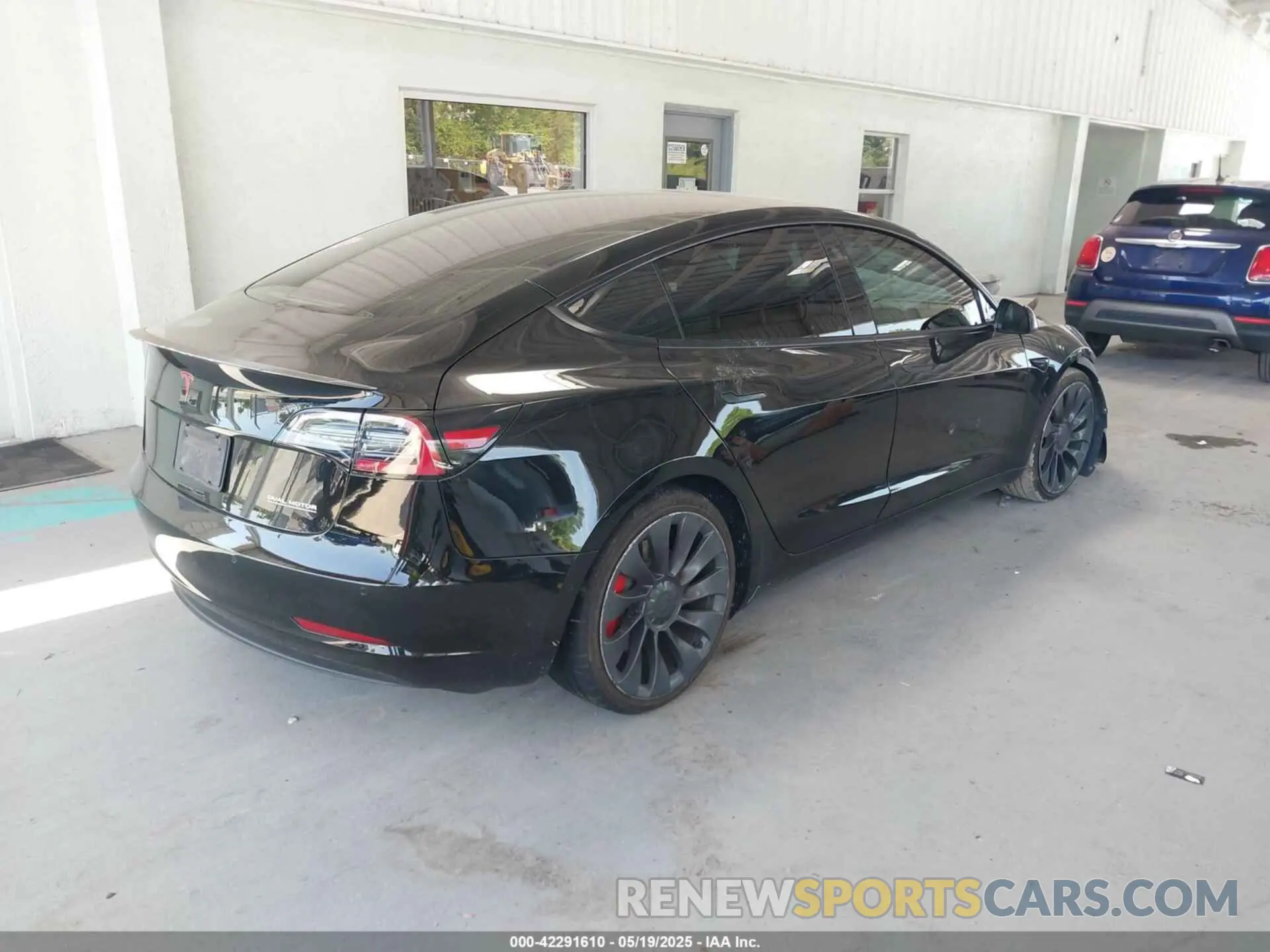 4 Photograph of a damaged car 5YJ3E1EC7MF849489 TESLA MODEL 3 2021