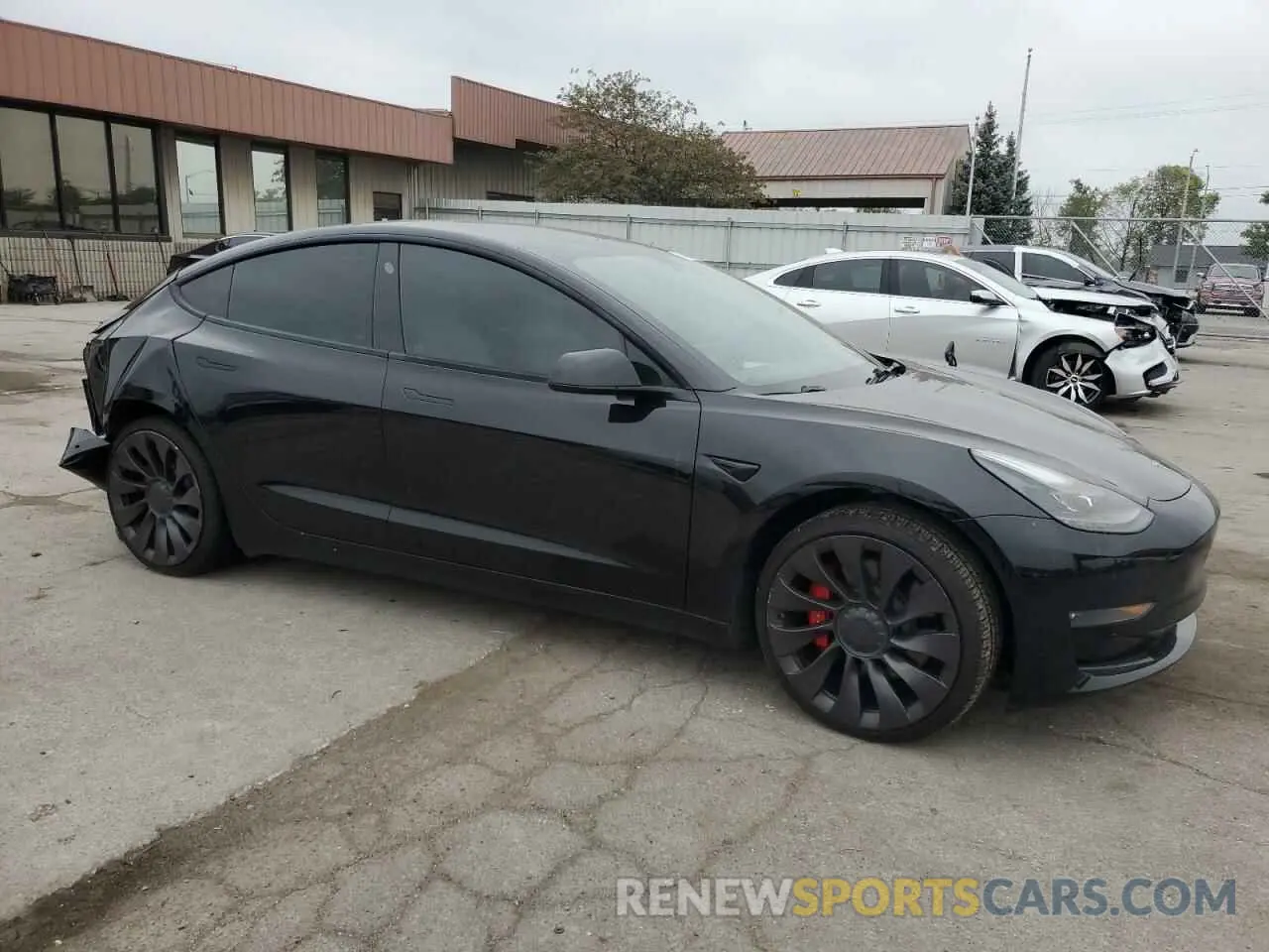 4 Photograph of a damaged car 5YJ3E1EC7MF975545 TESLA MODEL 3 2021