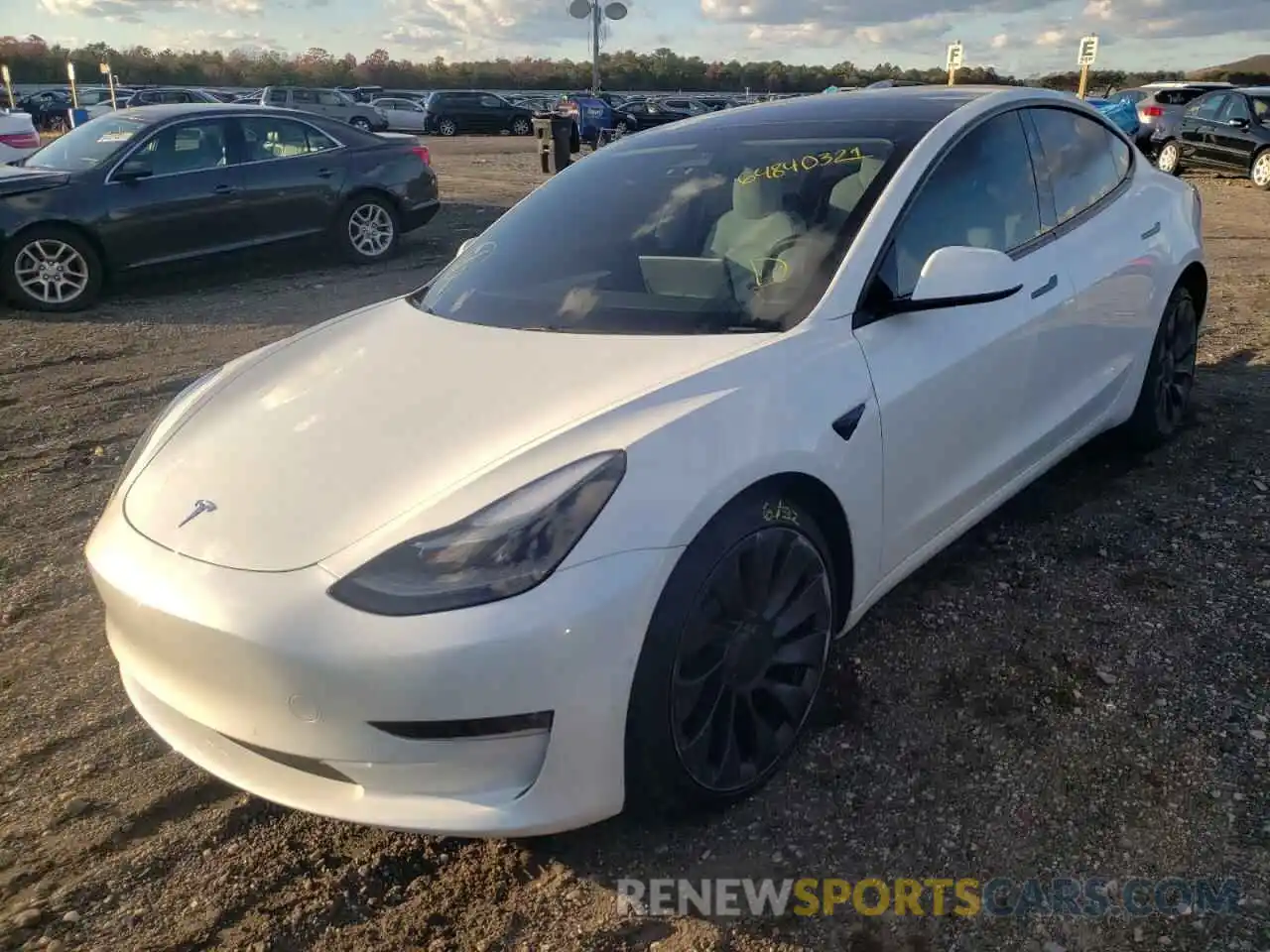 2 Photograph of a damaged car 5YJ3E1EC8MF061157 TESLA MODEL 3 2021