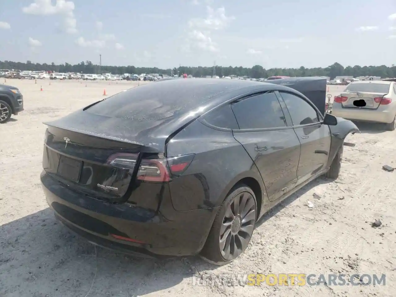 4 Photograph of a damaged car 5YJ3E1EC8MF849498 TESLA MODEL 3 2021