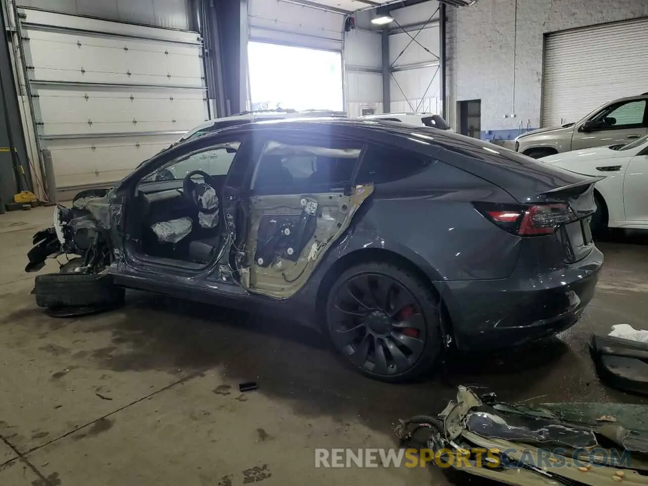 2 Photograph of a damaged car 5YJ3E1EC8MF860680 TESLA MODEL 3 2021