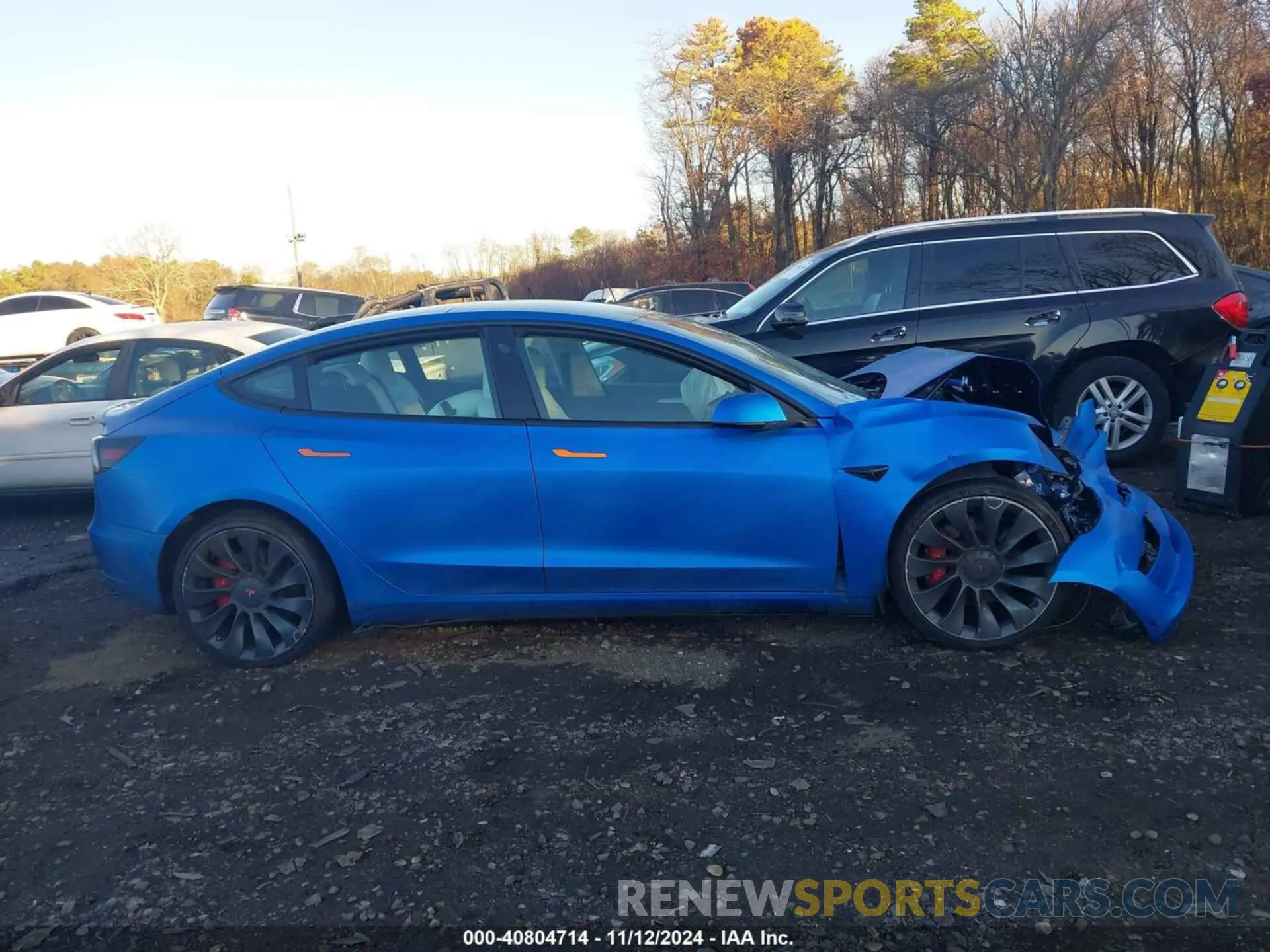 12 Photograph of a damaged car 5YJ3E1EC9MF059675 TESLA MODEL 3 2021