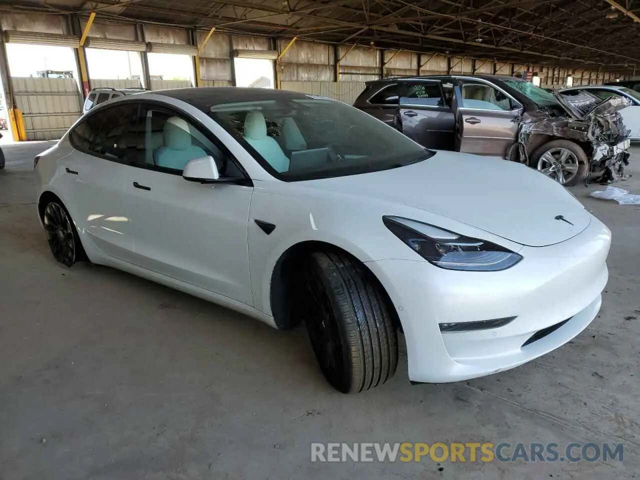4 Photograph of a damaged car 5YJ3E1EC9MF062673 TESLA MODEL 3 2021