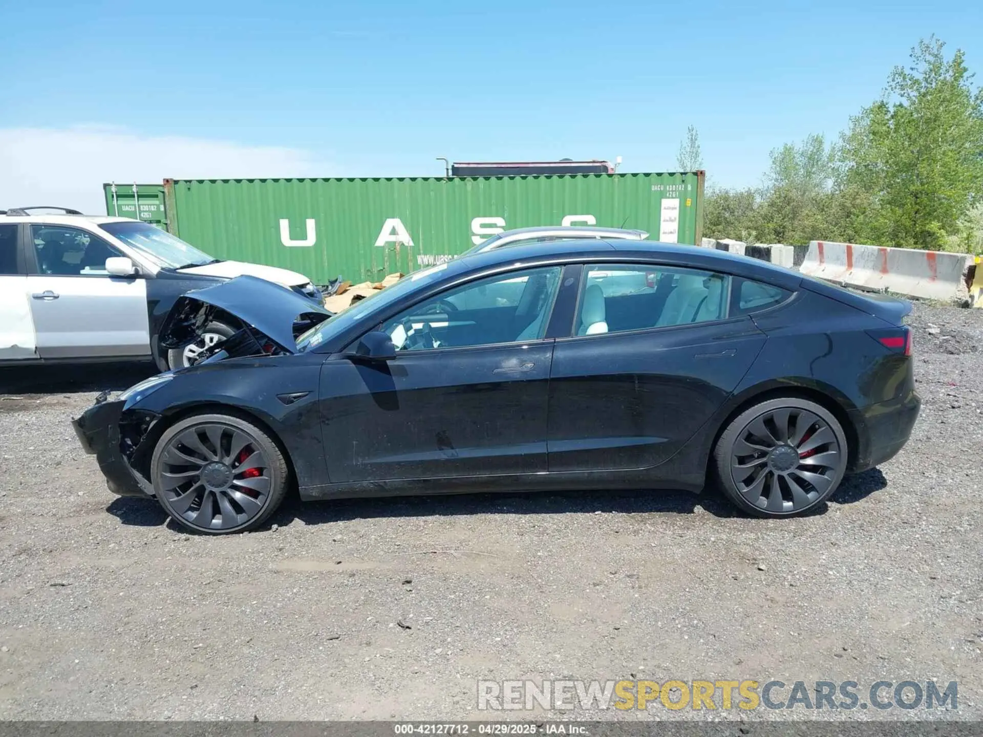 14 Photograph of a damaged car 5YJ3E1EC9MF091963 TESLA MODEL 3 2021