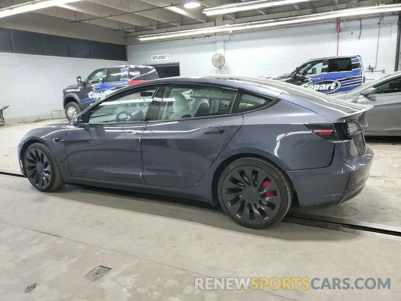 2 Photograph of a damaged car 5YJ3E1EC9MF093700 TESLA MODEL 3 2021
