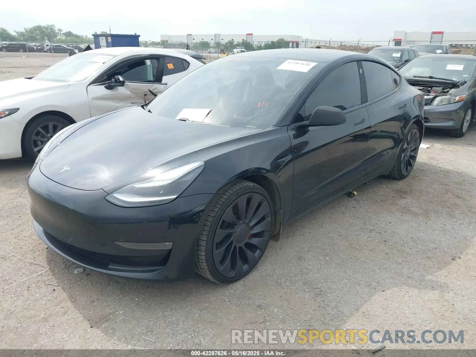 2 Photograph of a damaged car 5YJ3E1ECXMF056512 TESLA MODEL 3 2021