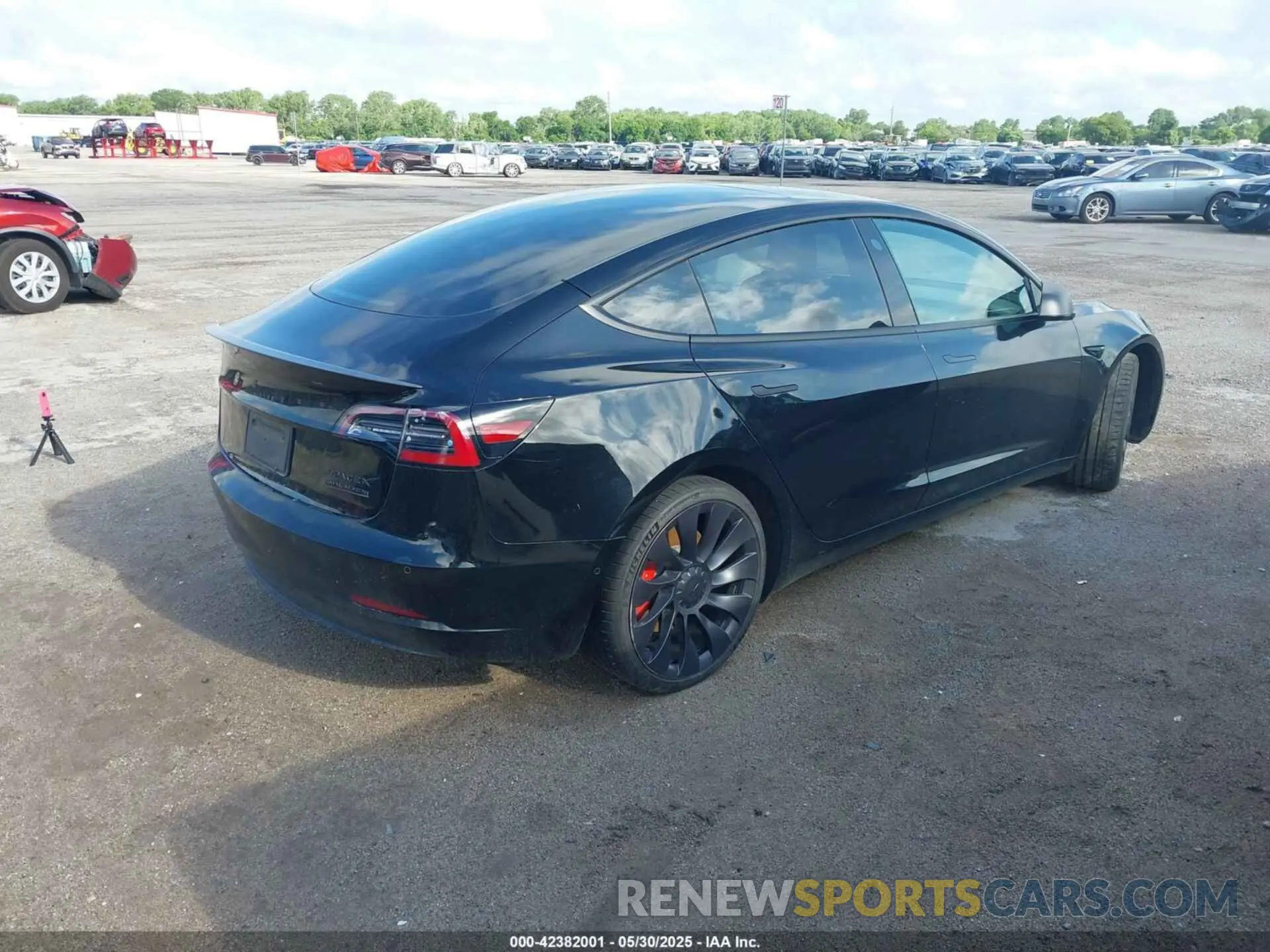 4 Photograph of a damaged car 5YJ3E1ECXMF060365 TESLA MODEL 3 2021