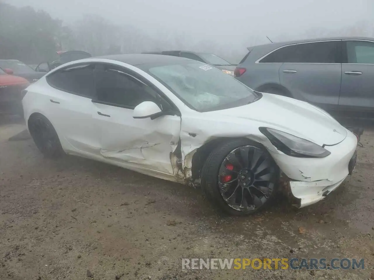 4 Photograph of a damaged car 5YJ3E1ECXMF984417 TESLA MODEL 3 2021
