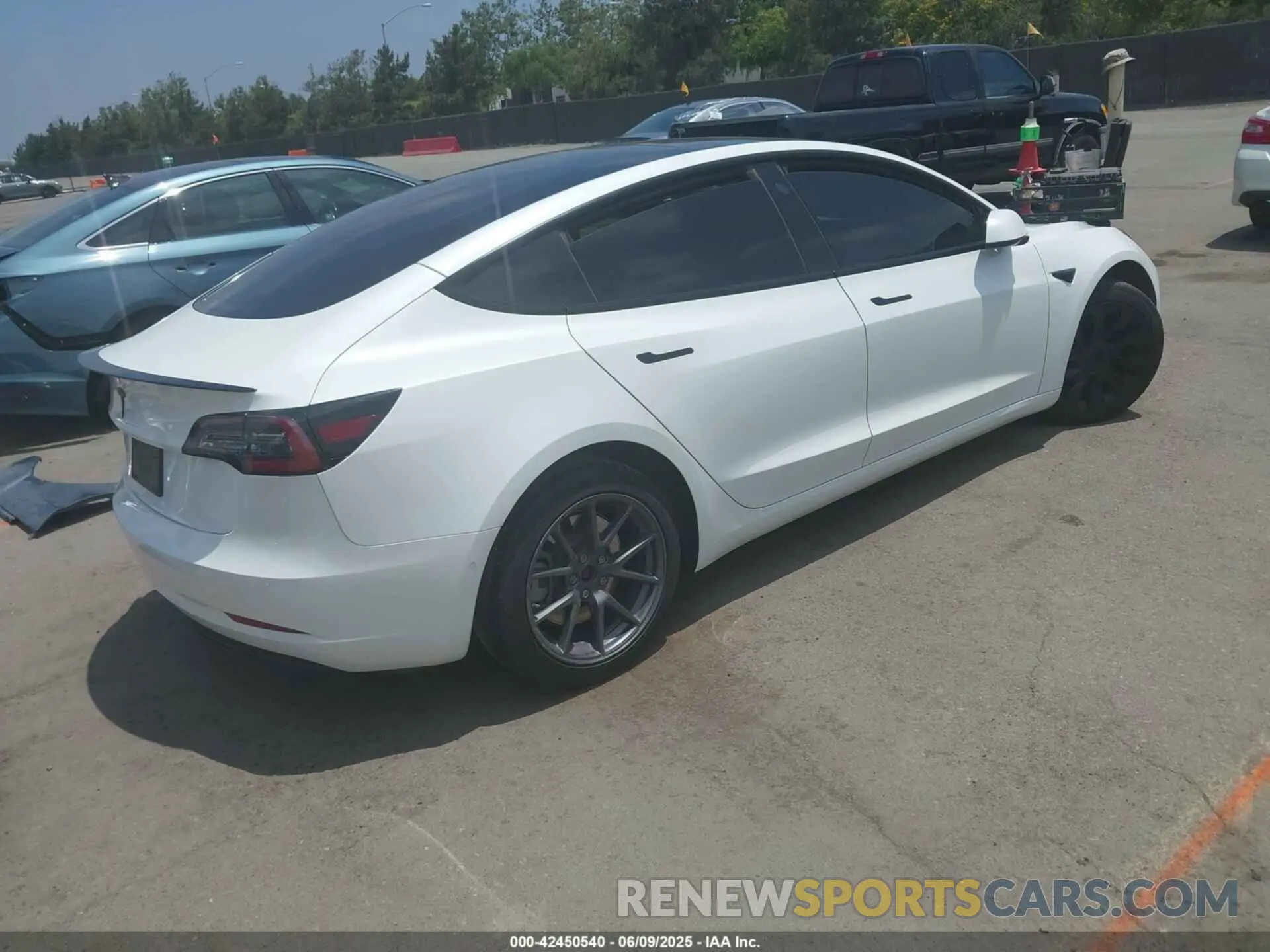 4 Photograph of a damaged car 5YJ3E1EA0NF102851 TESLA MODEL 3 2022